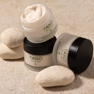 Balbisiana body butter on stone background