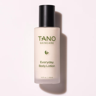 TANO Skincare Everyday Body Lotion bottle on a light pink background