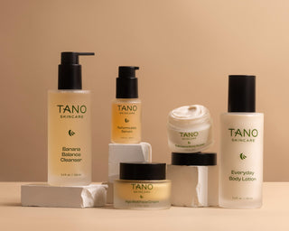 TANO skincare products on a beige background